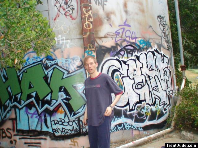 Undressing at the graffiti tank