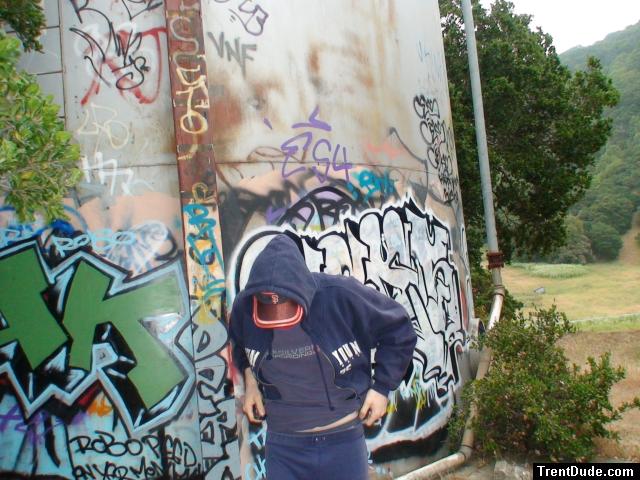 Wearing SF Giants hat, Quiksilver boarding t-shirt, blue Tommy Hilfiger sweats, Patagonia underwear showing