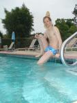 blue Speedo with splash pattern - relaxing at the pool side