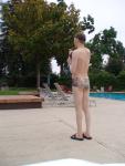 Rear side of green mood swim suit by Ami Sanzuri
