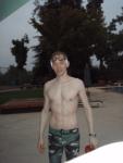 after  an intense swim wearing a camo swim jammer (smiling)