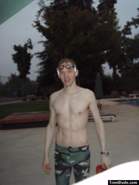 after  an intense swim wearing a camo swim jammer (smiling)