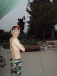 after  an intense swim wearing a camo swim jammer (smiling)