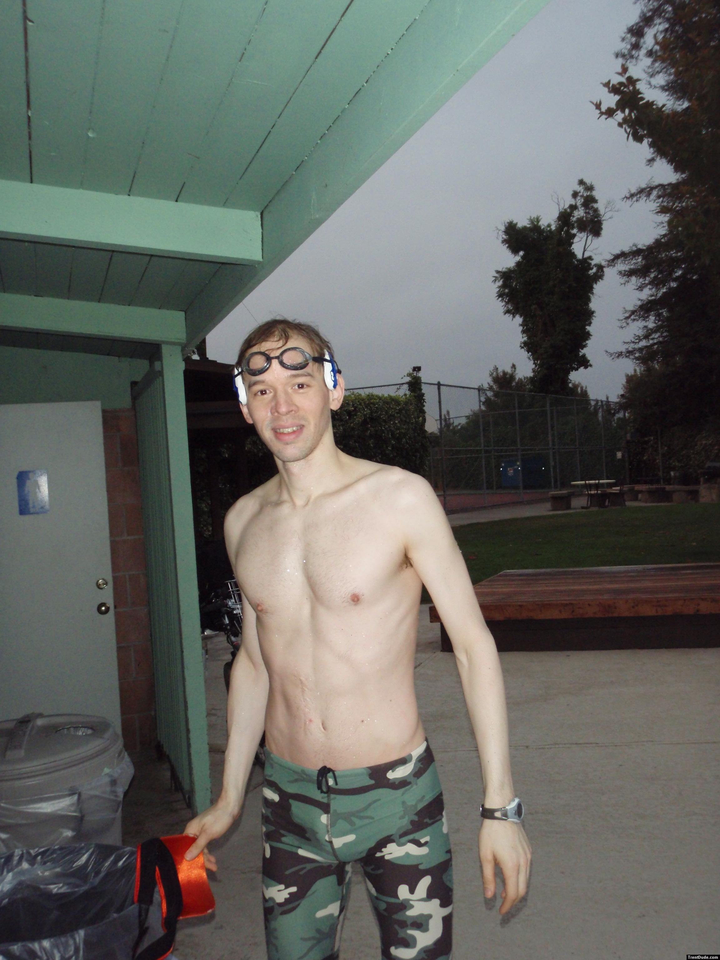 after  an intense swim wearing a camo swim jammer (smiling)