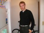 Trent in a black shirt, green pants