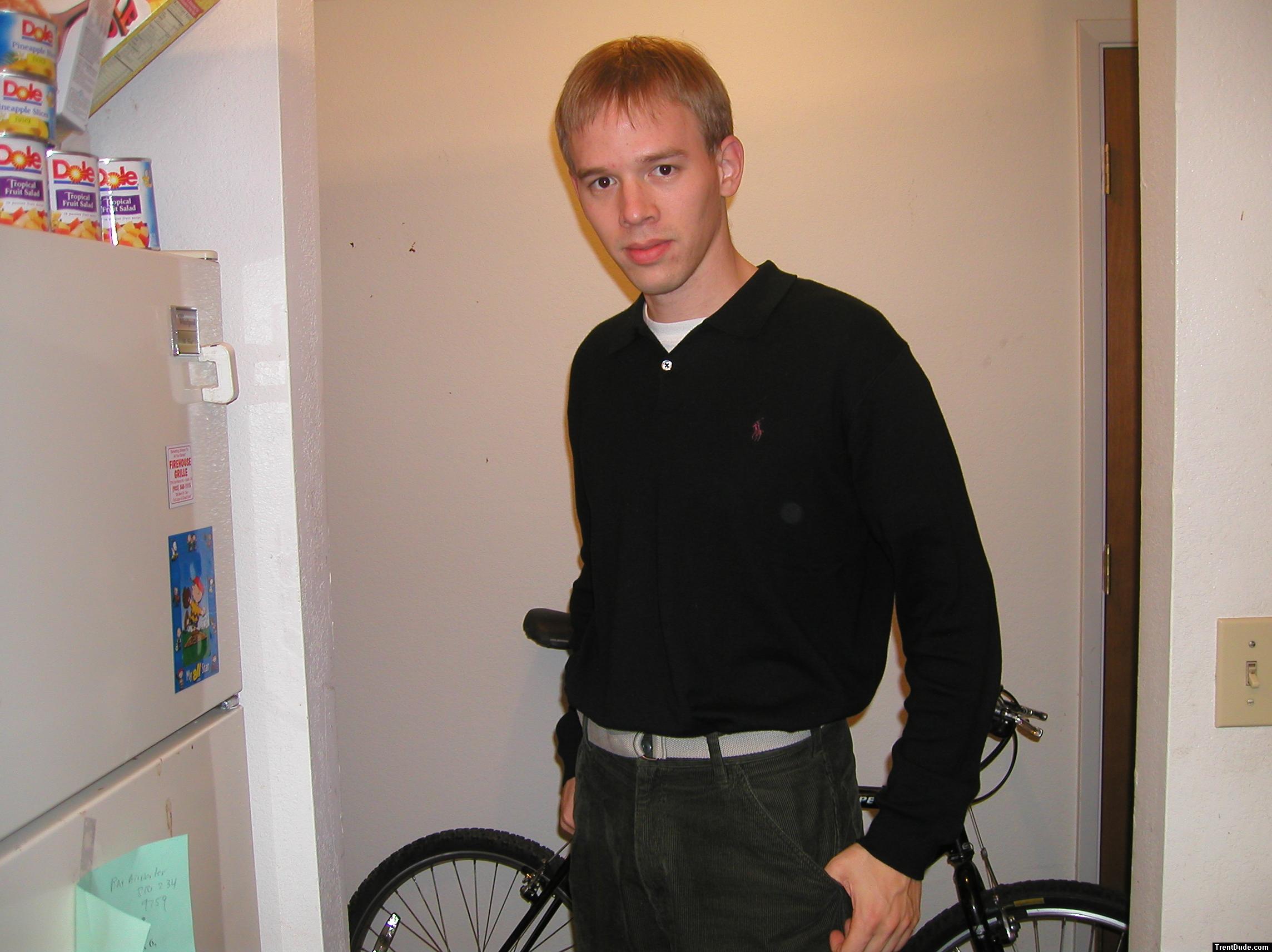 Trent in a black shirt, green pants