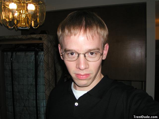 Trent in a black shirt, harry potter glasses