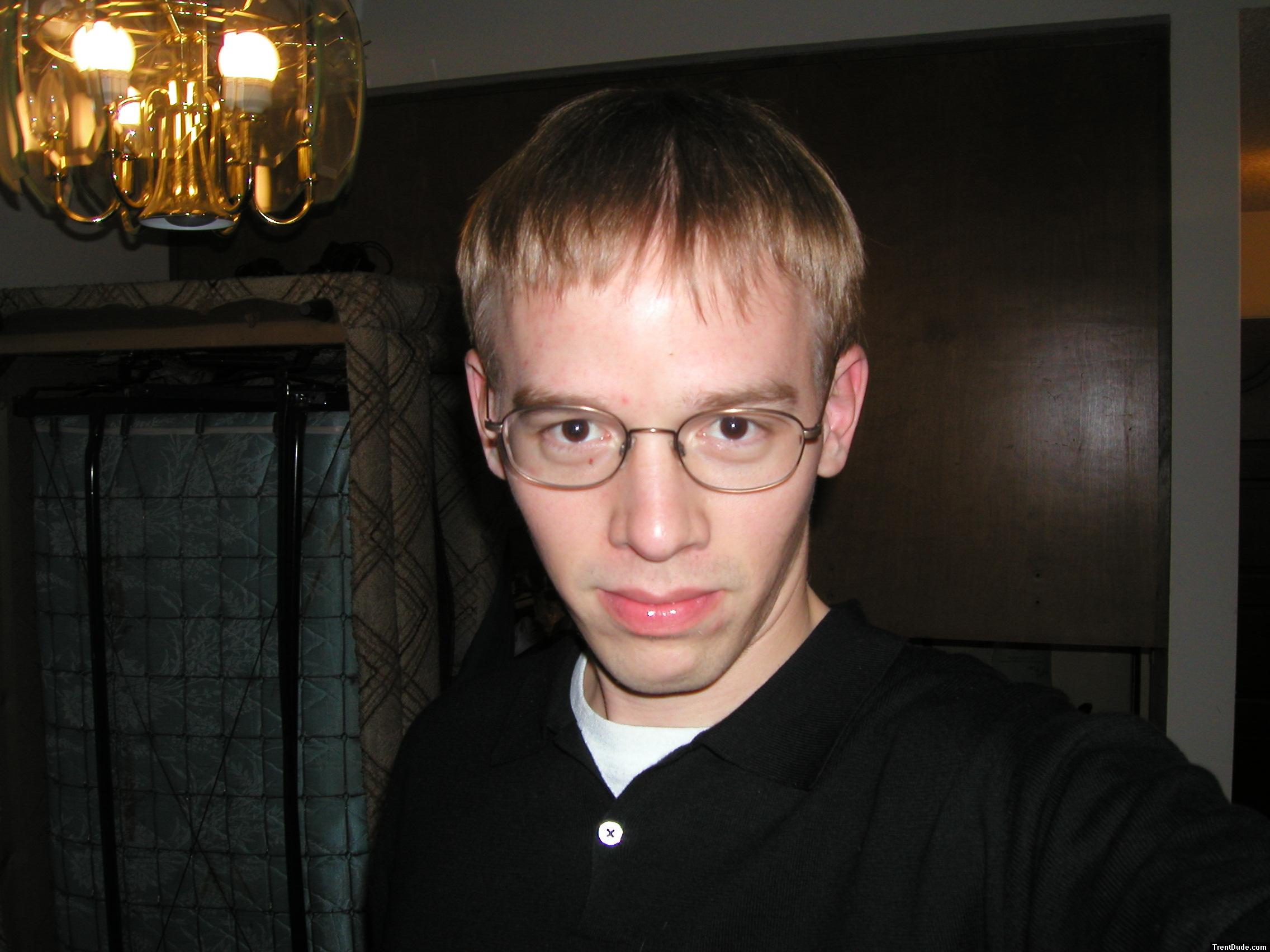 Trent in a black shirt, harry potter glasses