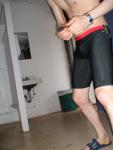 holding a remote - Nike Swim Men's Hydra Jammer from SwimOutlet.com