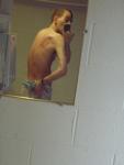 at the swimming pool in a towel (back)