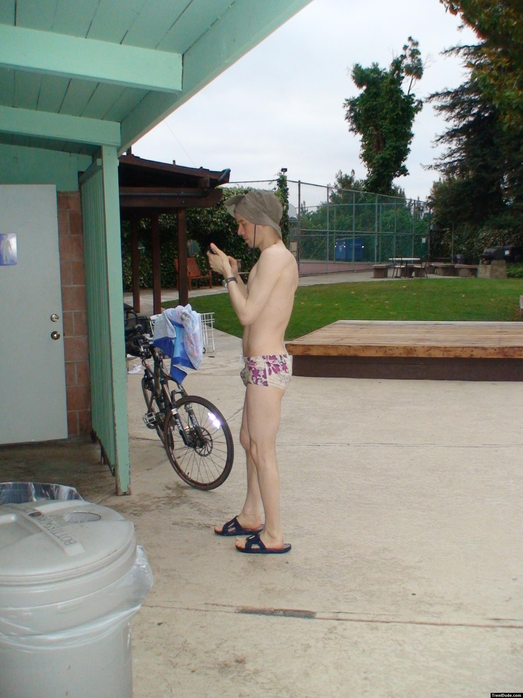 uploading the new swim photos to the web site (Mexicano swim brief from Ami Sanzuri.com, Outdoor Research Sun hat, Nike Slippers