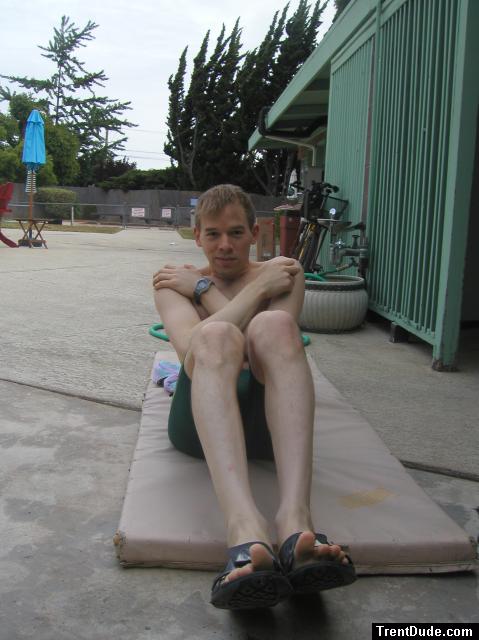 Crunches in a Nike swim jammer, toes in Nike slippers (best)