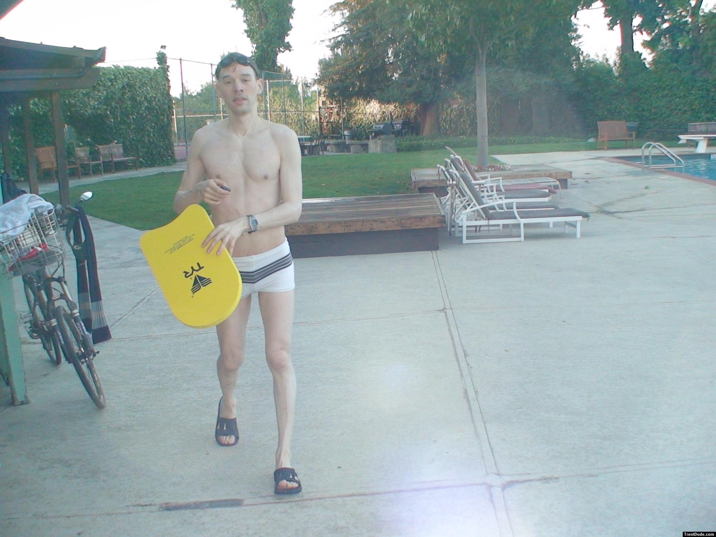 grabbing a kickboard from the bike