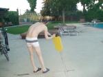 practicing swim form (white Speedo Engineered Stripe Square Cut suit) (rear)