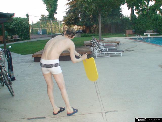practicing swim form (white Speedo Engineered Stripe Square Cut suit) (rear)