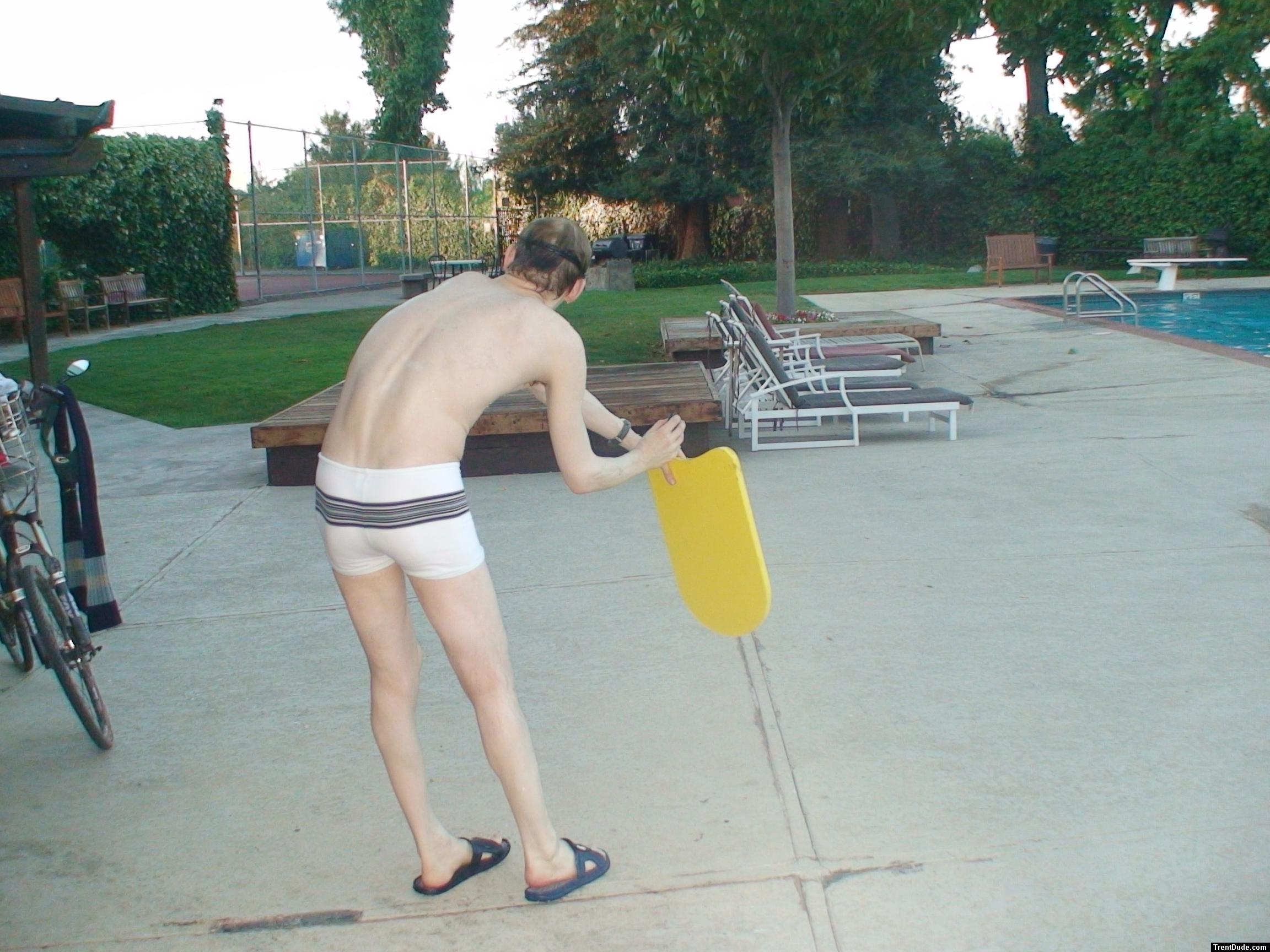 practicing swim form (white Speedo Engineered Stripe Square Cut suit) (rear)