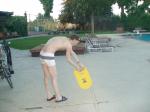 practicing some swimming form (rear)