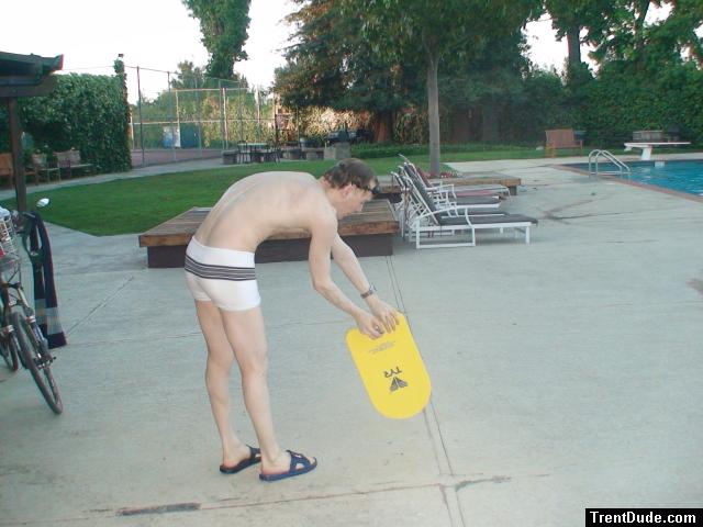 practicing some swimming form (rear)