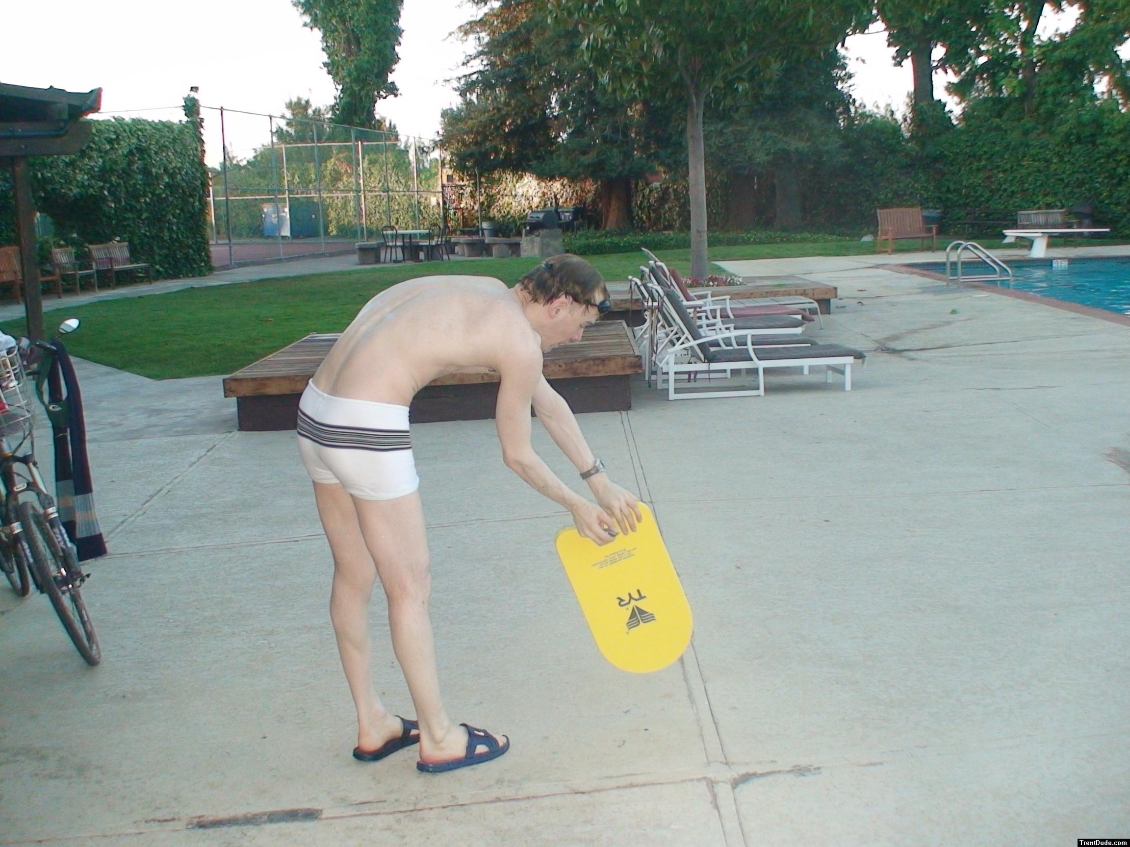 practicing some swimming form (rear)