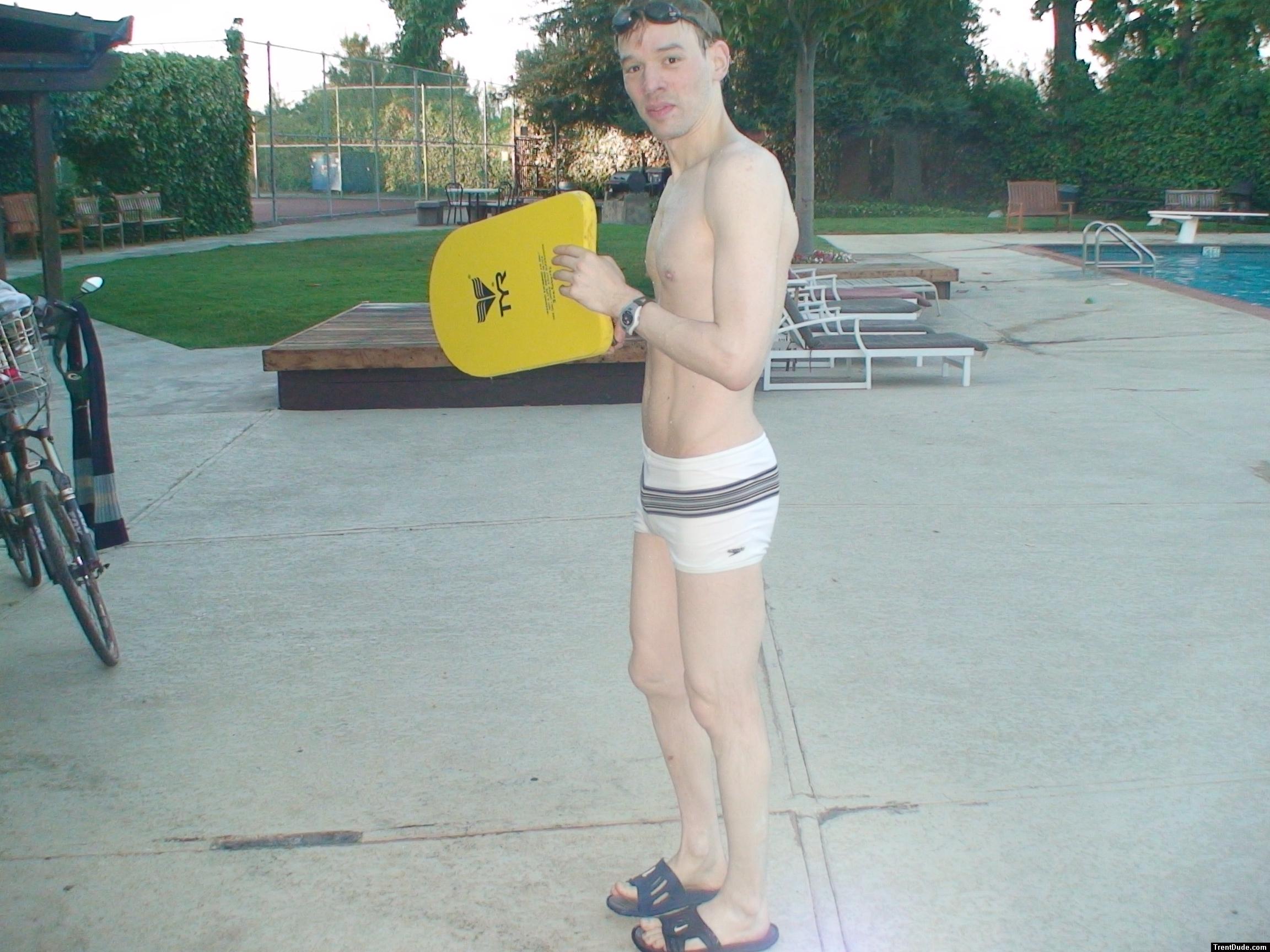 Swimmer with a white Speedo Engineered Stripe Square Cut suit, Tyr kick board (best)