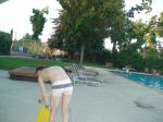 bending over to pick up the kickboard (rear) (best) (white Speedo Engineered Stripe Square Cut suit)