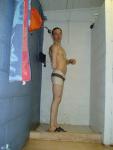Scrubbing his back in the shower