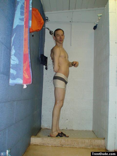 Scrubbing his back in the shower