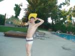 Swimmer with a white Speedo Engineered Stripe Square Cut suit, Tyr kick board (best)