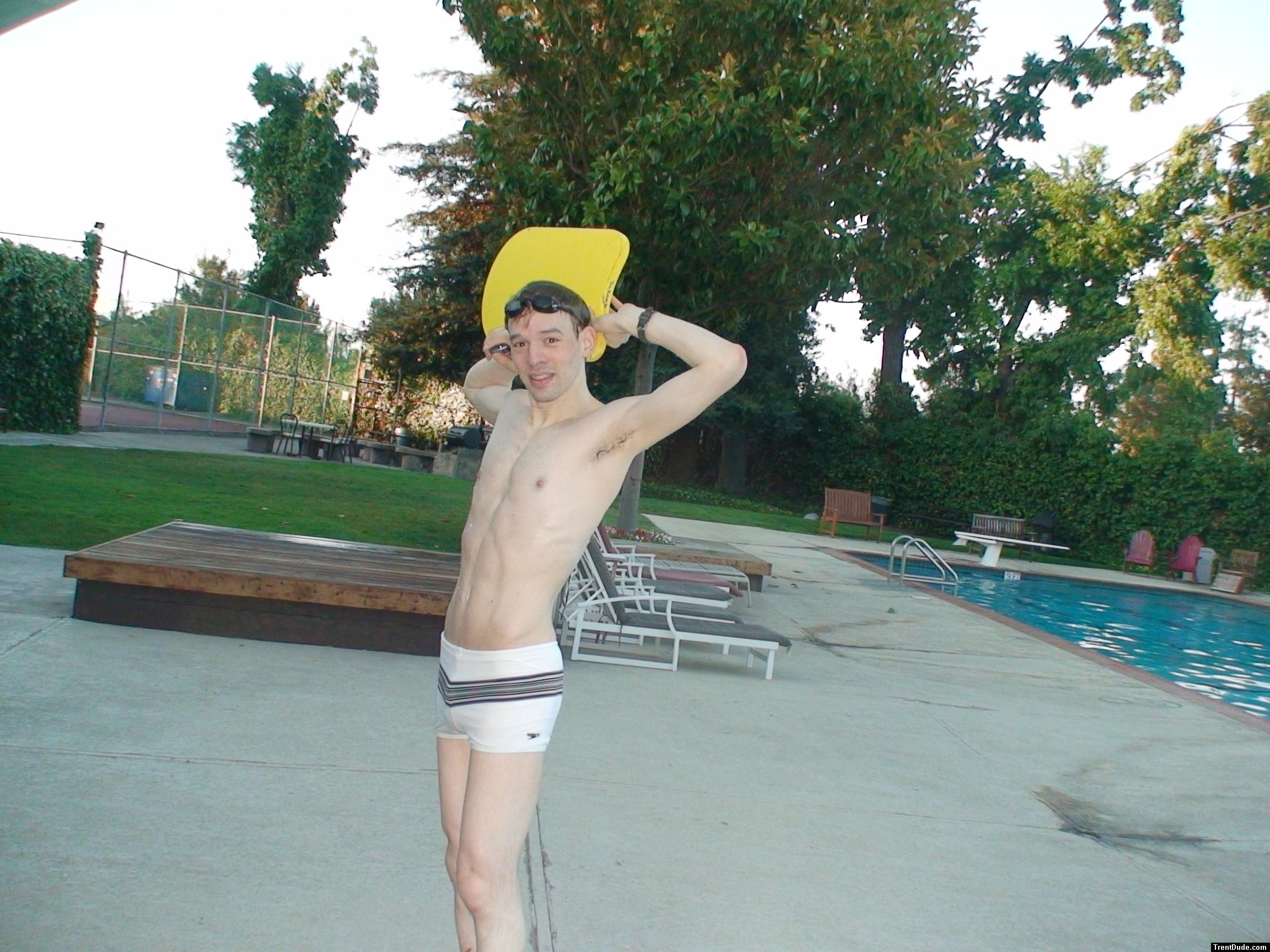 Swimmer with a white Speedo Engineered Stripe Square Cut suit, Tyr kick board (best)
