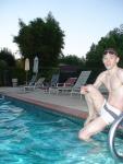 feet at the poolside in a white Speedo Engineered Stripe Square Cut suit