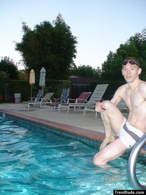 feet at the poolside in a white Speedo Engineered Stripe Square Cut suit