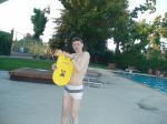 Swimmer with a white Speedo Engineered Stripe Square Cut suit, Tyr kick board (best)