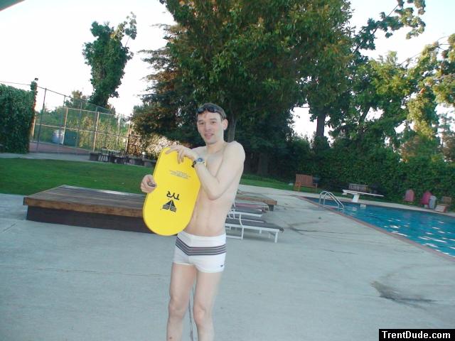 Swimmer with a white Speedo Engineered Stripe Square Cut suit, Tyr kick board (best)