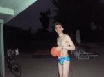 playing basketball before morning swim practice wearing a swimp3 google headphone and blue splash Speedo (best)