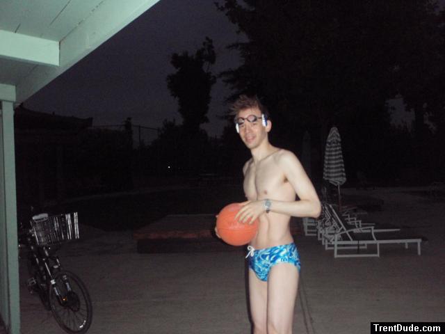 playing basketball before morning swim practice wearing a swimp3 google headphone and blue splash Speedo (best)
