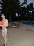 At the pool in a white speedo