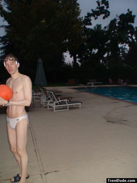 At the pool in a white speedo