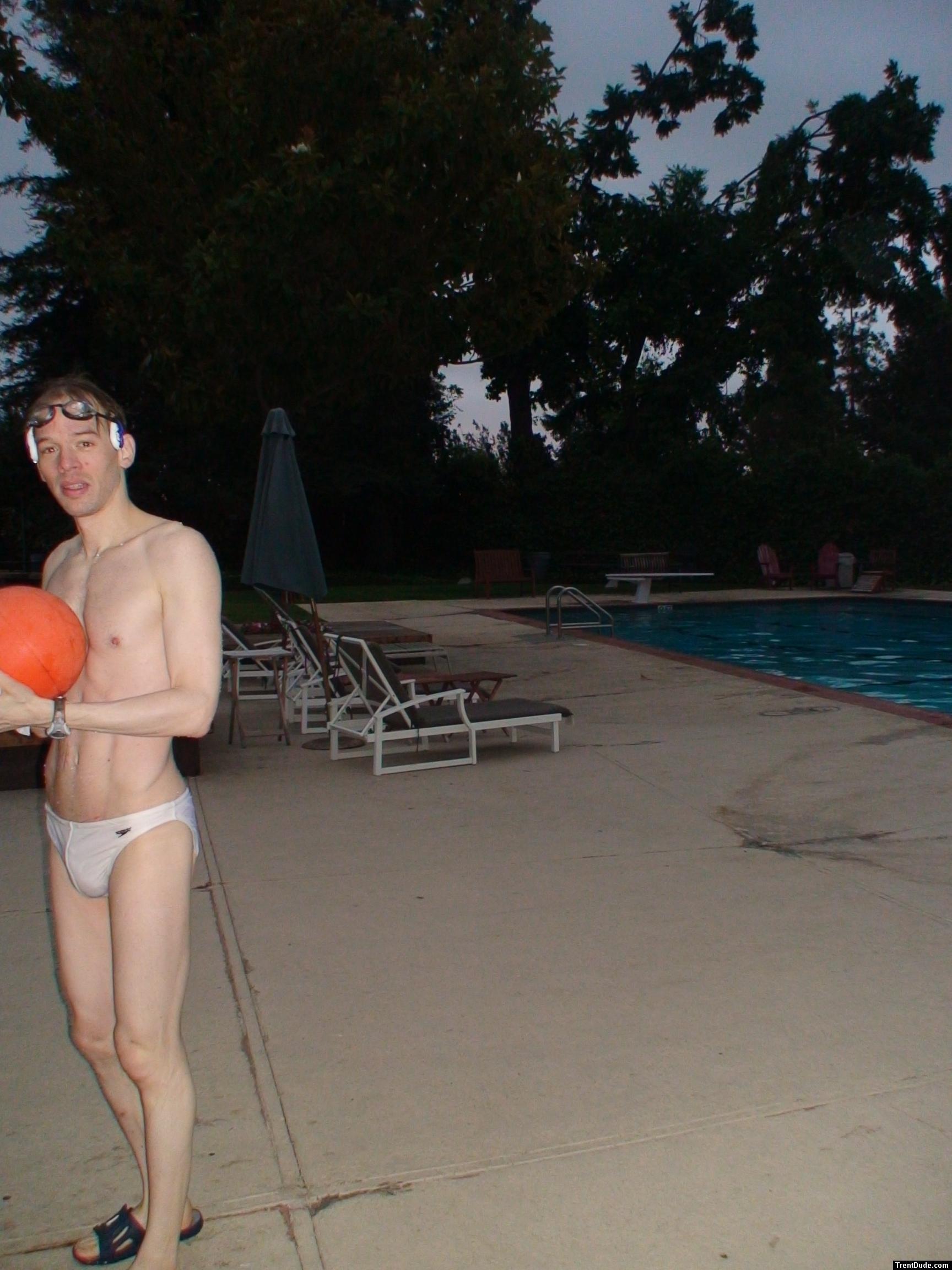 At the pool in a white speedo