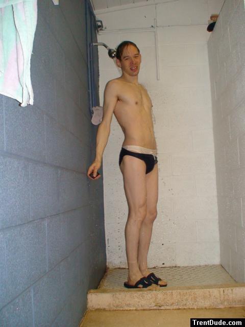 Embarrased to wear a white speedo, so he puts a blue speedo on top