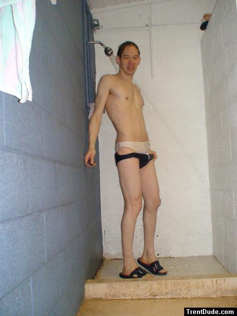 A navy blue solar speedo is over the white speedo (for more warmth while swimming)