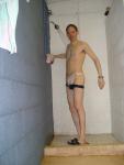 A navy blue solar speedo is over the white speedo (for more warmth while swimming)