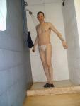 Glad no one else is in the locker room to see him in his white speedo
