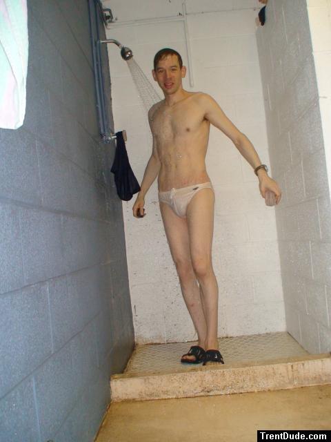 Glad no one else is in the locker room to see him in his white speedo