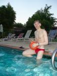 About to play water polo in a red speedo with a black Speedo underneath