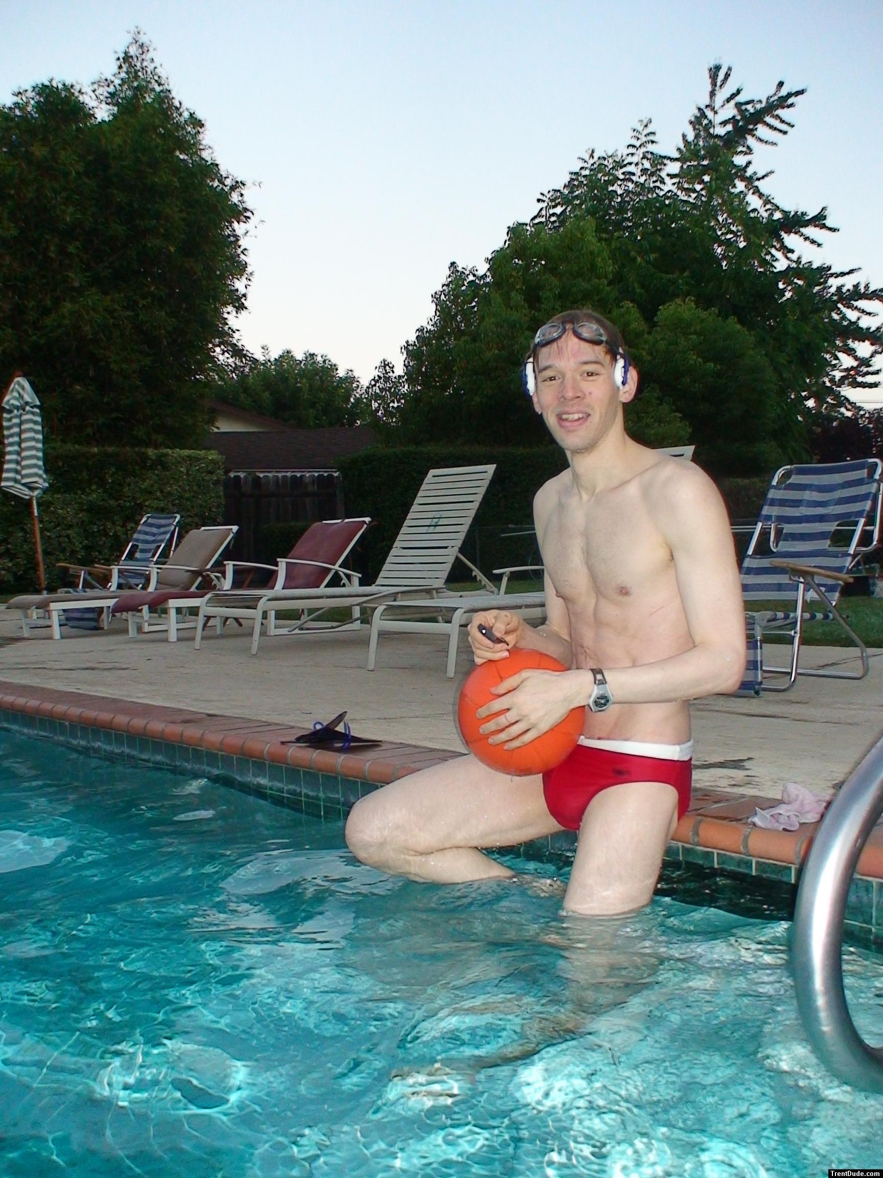 About to play water polo in a red speedo with a black Speedo underneath
