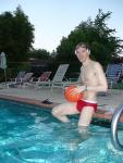 About to play water polo in a red speedo with a black Speedo underneath