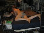 dude laying on bed in his underwear wearing a grey Tommy Hilfiger brief (rear)