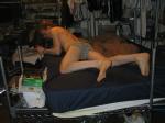 dude laying on bed in his underwear wearing a grey Tommy Hilfiger brief (rear)