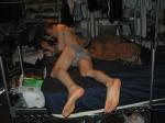 dude laying on bed in his underwear wearing a grey Tommy Hilfiger brief (feet, rear)