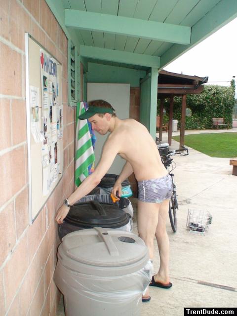 putting out the trash in a Pirates swimsuit by designer Ami Sanzuri